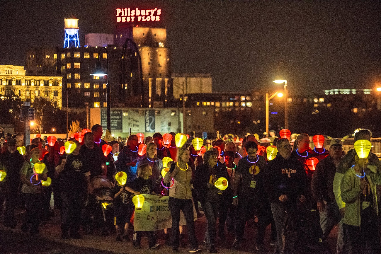 Light The Night walkers on the bridge